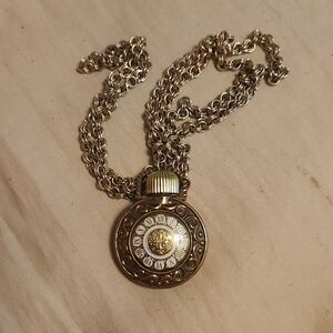 AVON MOONWIND POCKET WATCH CLOCK NECKLACE PENDANT PERFUME BOTTLE  3/4 Full